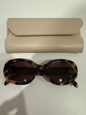 Women’s Tortoiseshell Oval Sunglasses with Beige Case
